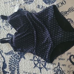 Navy one piece swim suit. Size medium. Never worn.